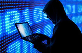 Silueta de persona con laptop.